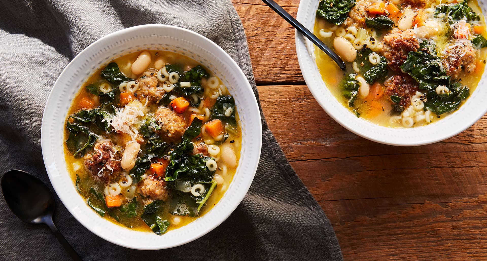 types of soup: two bowls of cheater's italian wedding soup on a table