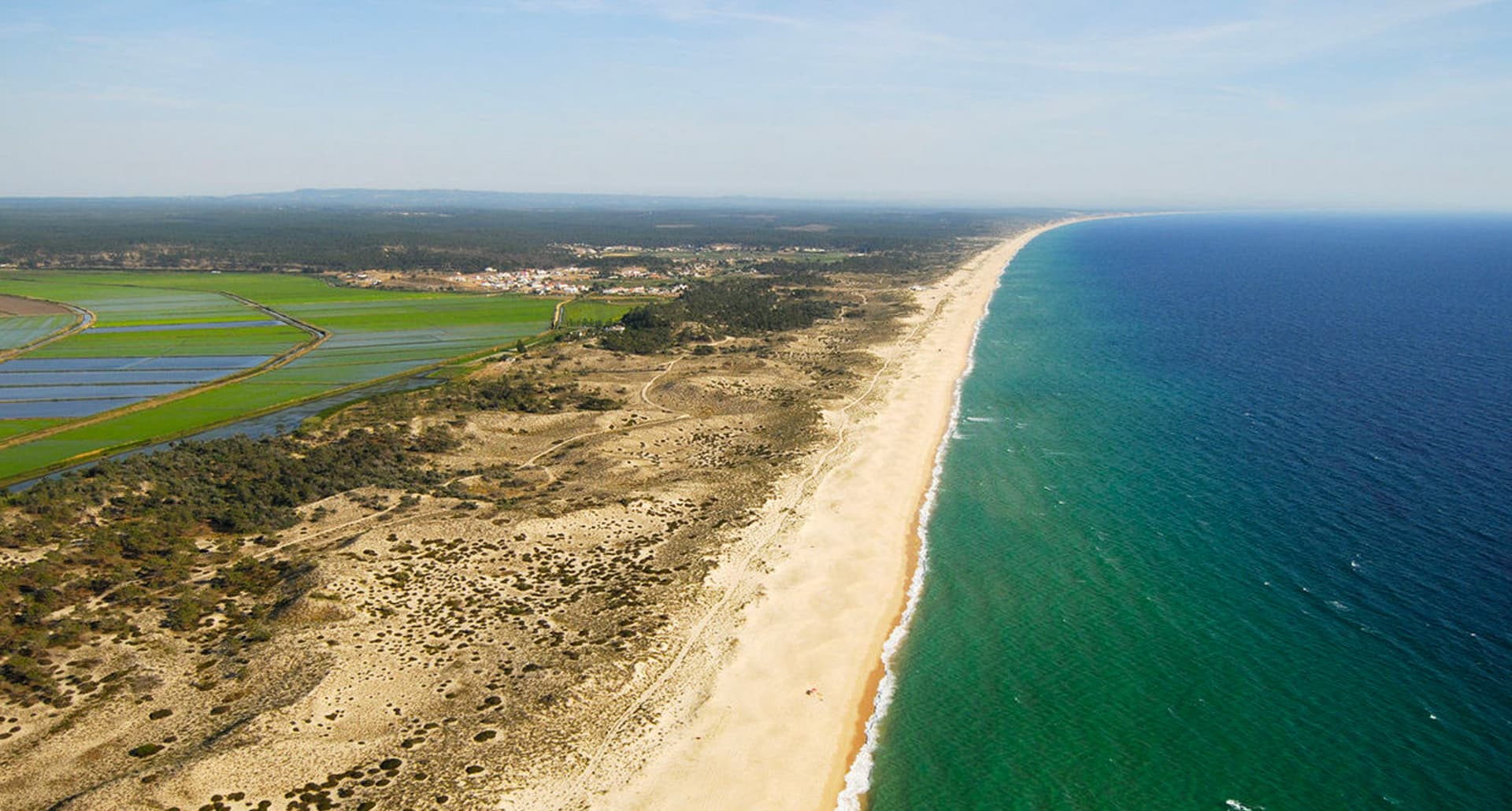 Aerial shot of Comporta Portugal, beach and coastline.