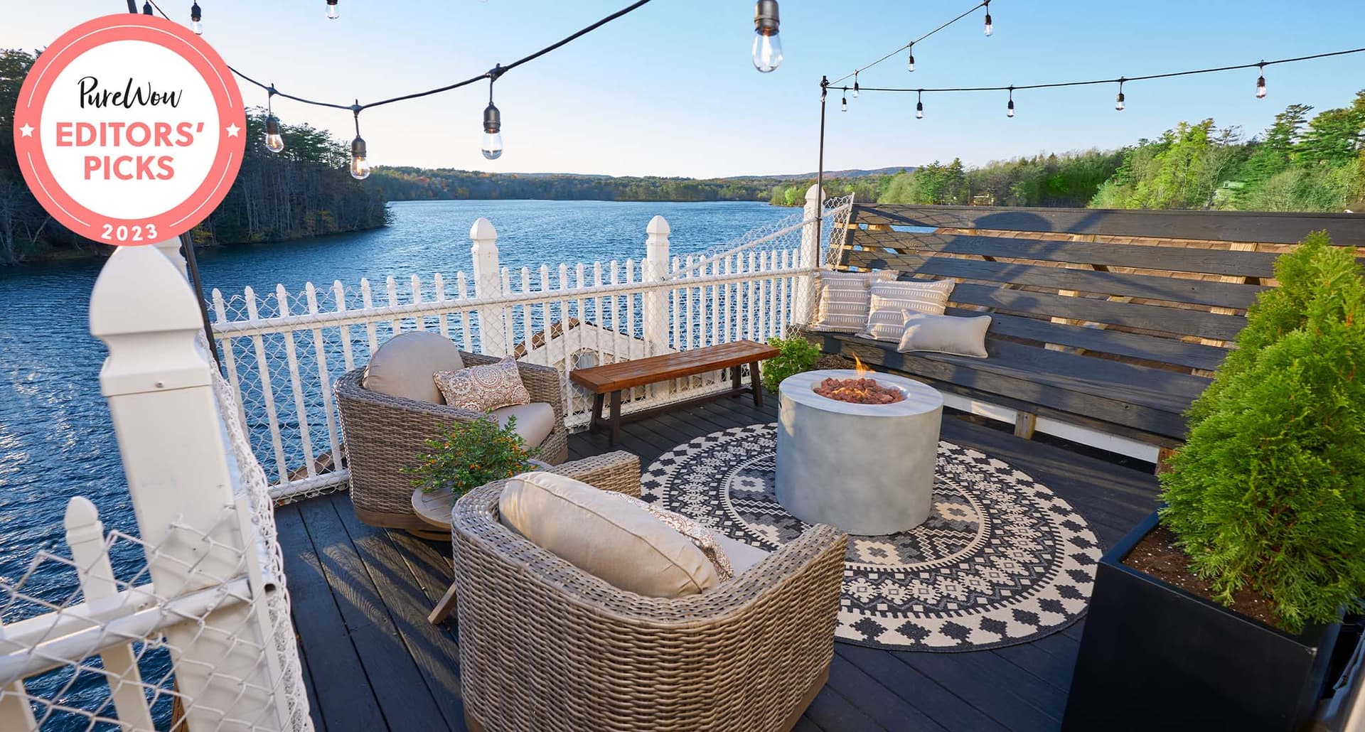 Berkshire vacation rental: A patio deck with string lights and a fire pit