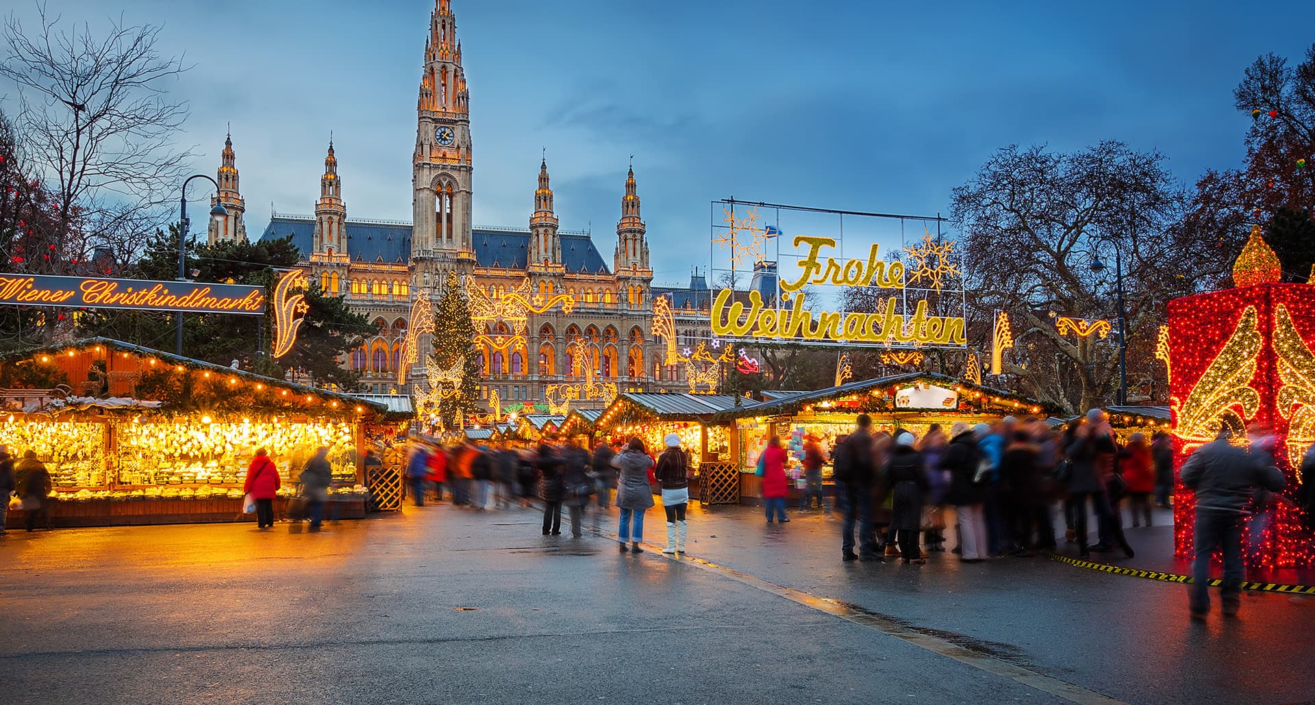 best-christmas-markets-in-europe: a local christmas market with lots of lights and decorations.