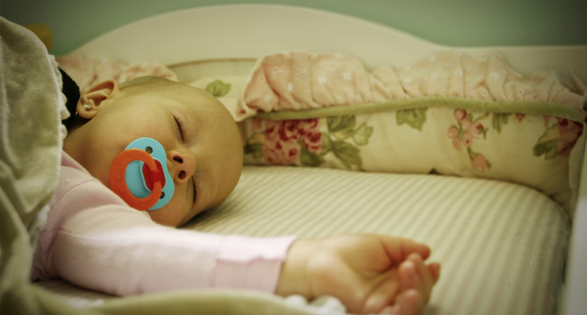 is-white-noise-bad-for-babies: a sleeping baby.