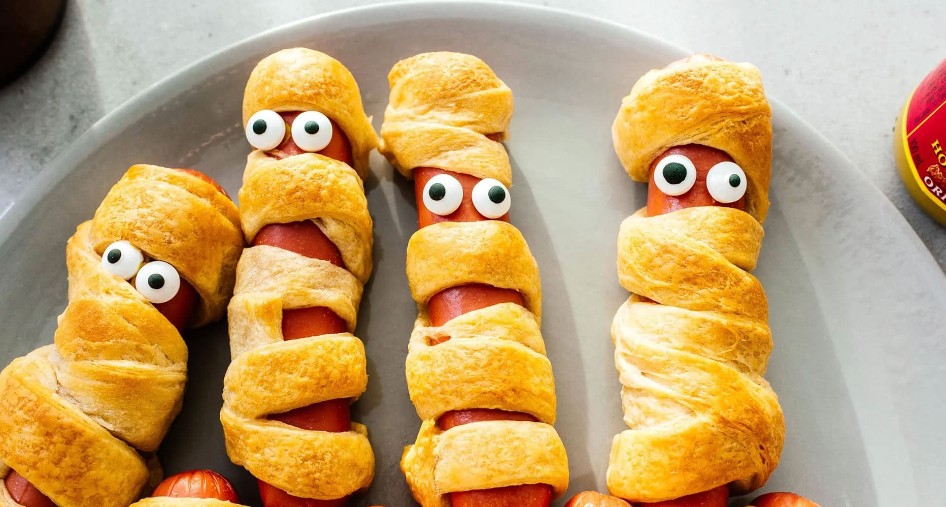 halloween snacks: mummy hot dogs