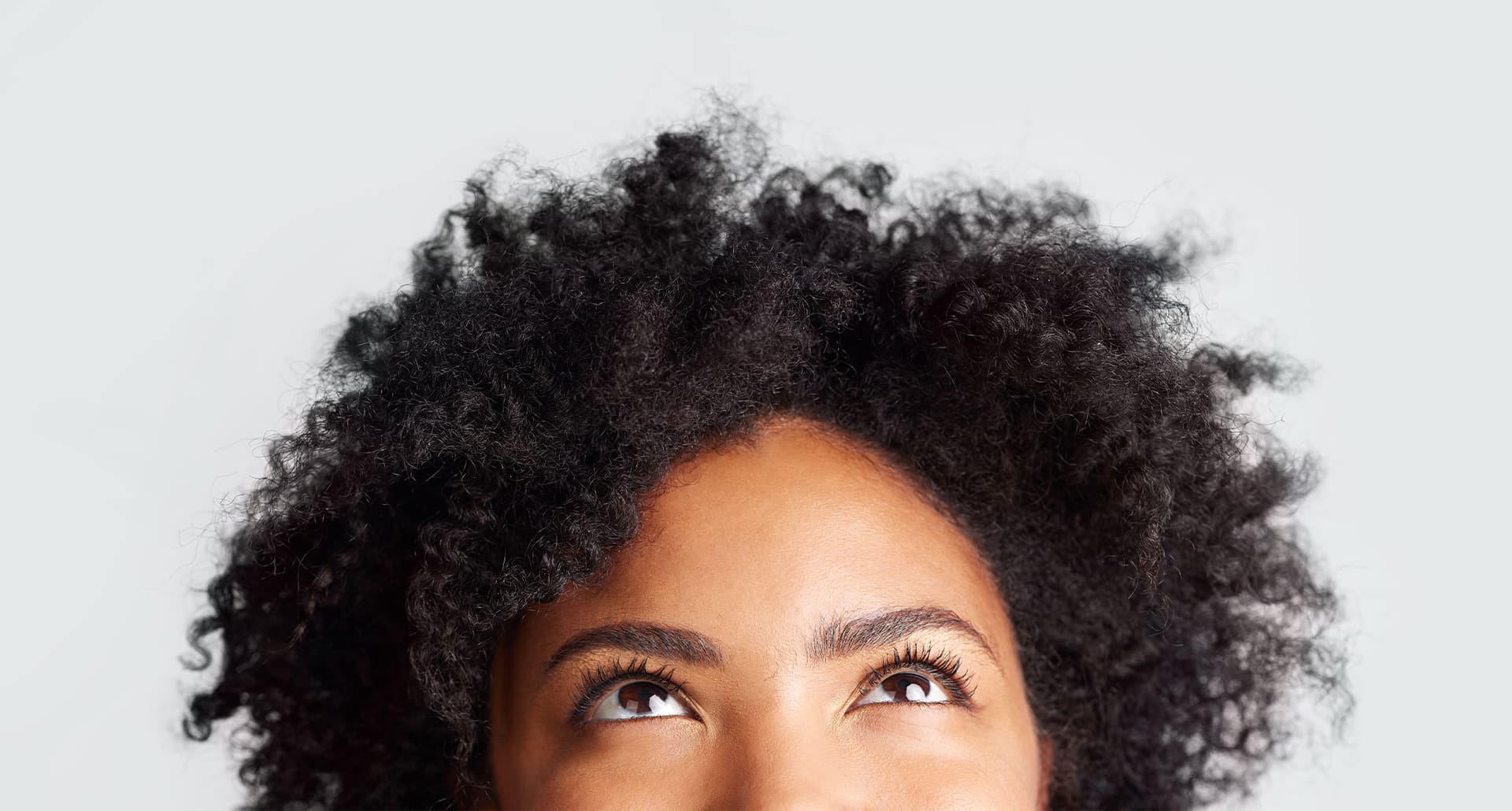 what is hair porosity a photo of a woman looking up at her hair