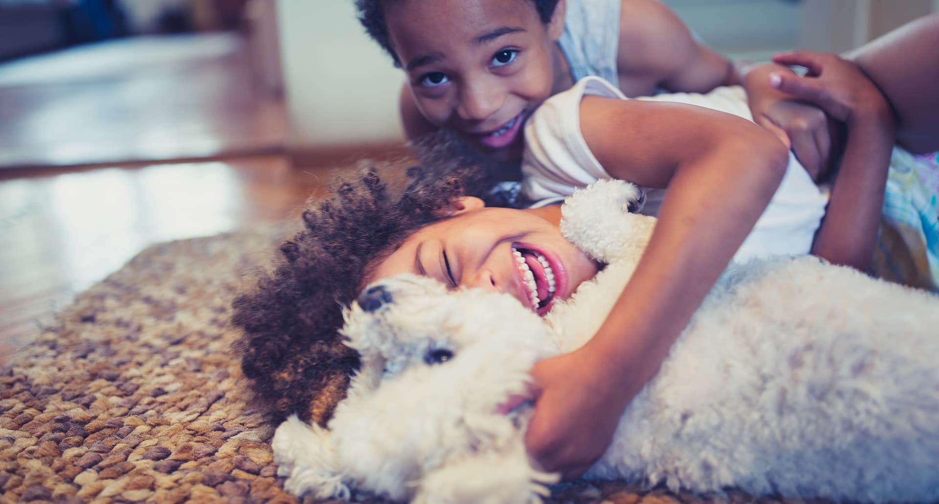 kids with autism hugging emotional support dog