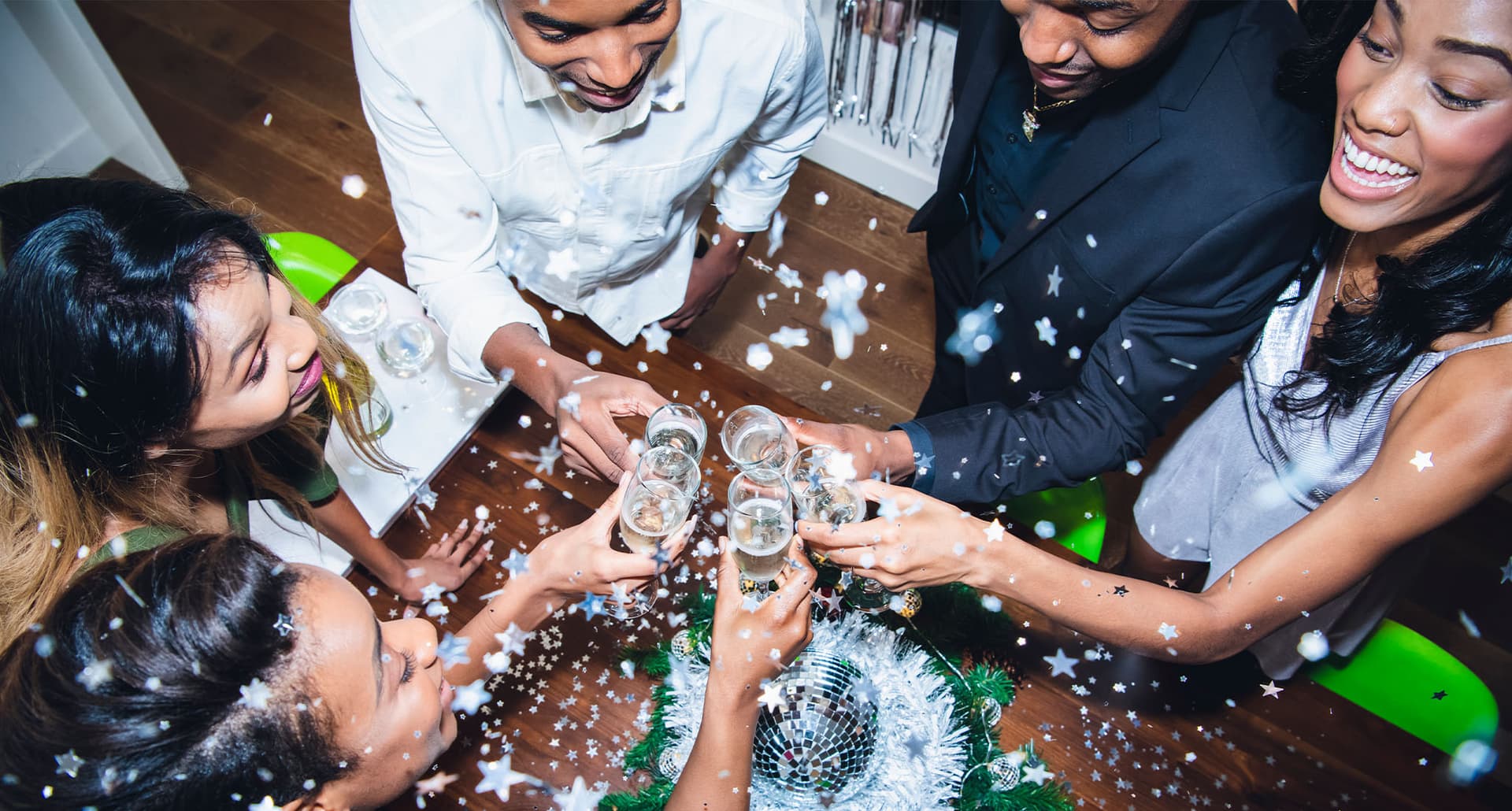 People toasting for new years TOP New Years Eve Games to Ring in 2023 Universal