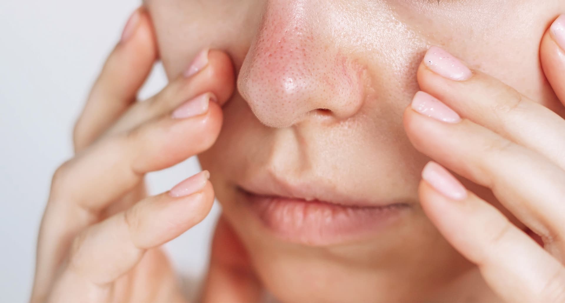 Close up of woman's nose, concerned she has "pregnancy nose"