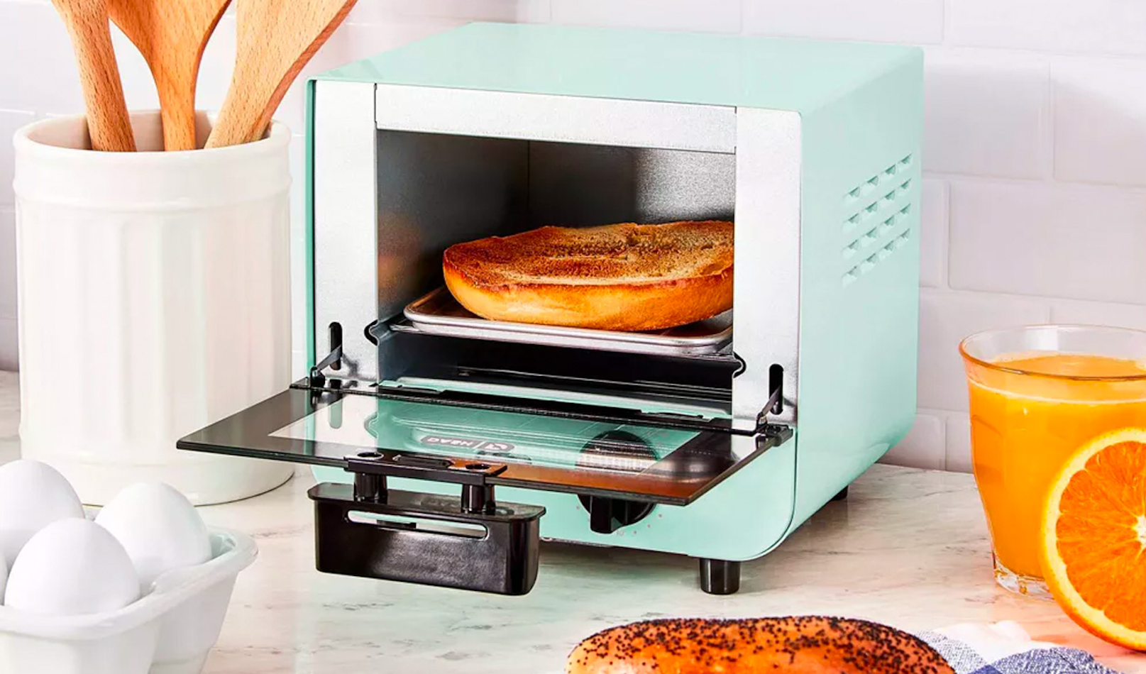 https://www.purewow.com/stories/the-best-toaster-ovens-for-a-hassle-free-meal/assets/1.png